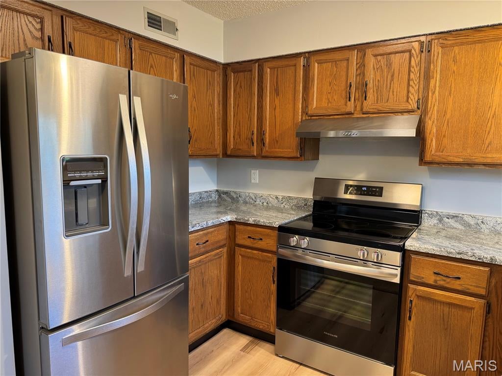 Photo of 808 Huckleberry Heights Drive, Hannibal, MO 63401 (MLS # 26056722)