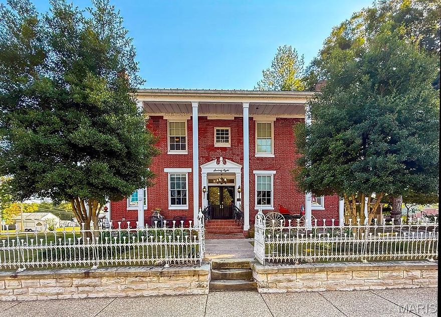 Let this historic home takes its place in your Christmas plans this year. Create your very own HALLMARK like holiday. Classic features, ornate trim, a crackling fire in nearly every room. The kitchen if fully equipped with top of the line commercial appliances. This home is charming and offers the potential for a great business or just enjoying the the home for yourself.
The Inn St Gemme Beauvais is "reportedly" the oldest  Bed and Breakfast in Missouri now in a National Historical Park. Complete renovation 2008-2009 plumbing,wiring,including $1.5 million to return to historical character from fire. It's In Architectural Digest 25 Best Small Towns In America, December 2019. Beautiful 3 Story brick colonial mansion. Elegant dining room w/original wood floors, fireplace & 19th century crystal chandelier. Recently Updated Commercial Style Kitchen, Brand new carpet throughout. Office. 2 guest suite on the main level. 4 guest suites on the 2nd level. 2 guest suites on the 3rd level. Basement has a family/game room w/fireplace, laundry room, & storage. There are a total of 8 fireplaces in the Inn. . There is a carriage house out back consists of a bed,fireplace, kitchen area, full bath. As a turnkey property (operation) it includes most furnishings.