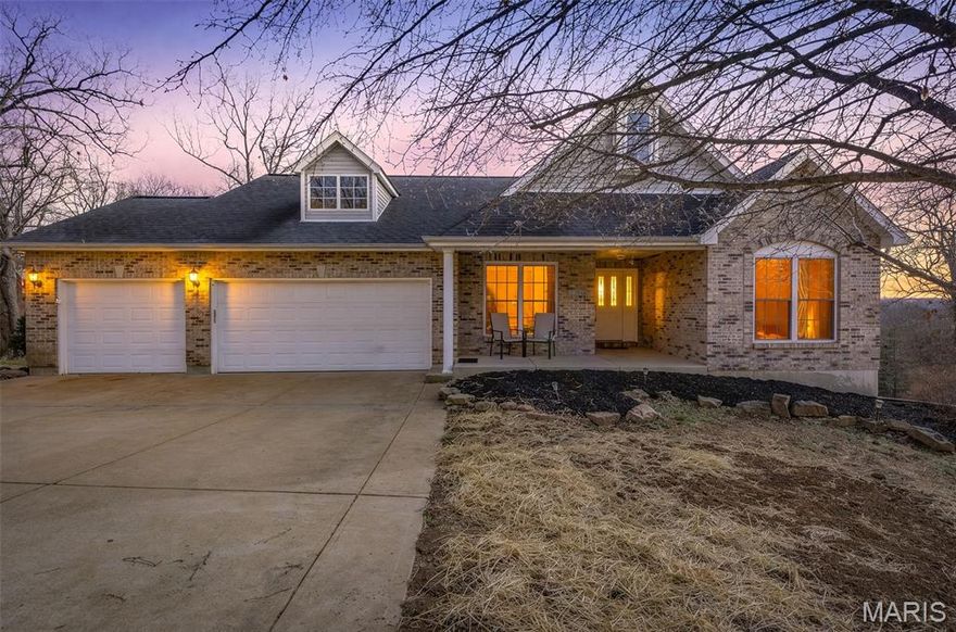 Gorgeous, spacious home featuring extensive updates and modern finishes! The interior boasts a newly updated kitchen equipped with custom cabinetry, quartz countertops, and stainless steel appliances. The primary bedroom offers a private retreat with an oversized walk-in closet and an updated ensuite featuring a double vanity, soaking tub, and a walk-in shower. Newly carpeted stairs lead to a partially finished walkout basement that includes a versatile room perfect for a home office or additional sleeping area, ample natural light, and rough-in plumbing for a future full bath. The exterior of the home is equally impressive, featuring a covered front porch, a concrete patio and a newly constructed deck. The large backyard backs to woods, providing a peaceful and serene environment. Further updates include a new electric fireplace insert, new interior doors, some new exterior doors, and new windows in the living room and the primary bedroom. This home provides significant storage throughout, including an oversized three-car garage with newly painted concrete floors. Situated on approximately one acre with no HOA, this home is conveniently located just minutes from Interstate 55, shopping, entertainment, and dining.