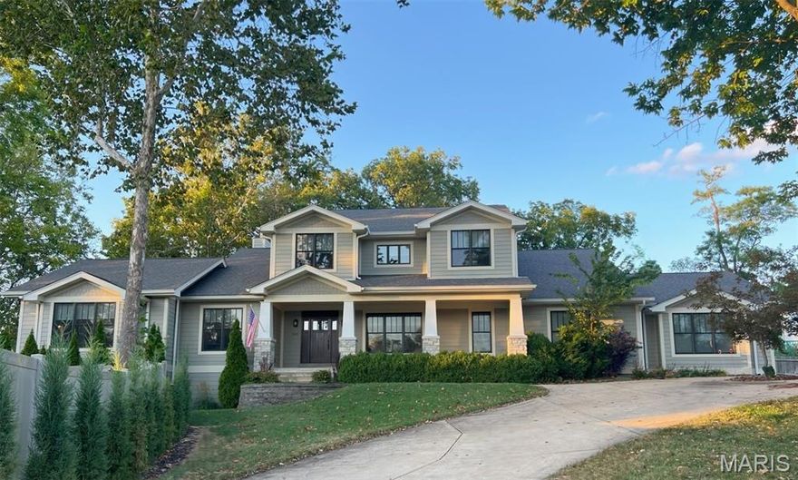 Experience refined living in the heart of Kirkwood. Ideally situated near Kirkwood Park, Pool, & the vibrant boutiques & restaurants of downtown, this exquisite residence rests on a serene half-acre, wooded lot in coveted Sugar Creek. With over 5,400 square feet of sophisticated design! Every detail has been thoughtfully curated to blend timeless elegance with modern comfort. The exterior boasts James Hardie cement siding and a discreet rear-entry three-car garage, setting the tone for the craftsmanship within. A gourmet chef’s kitchen serves as the home’s centerpiece, featuring granite surfaces, custom 42-inch cabinetry, a butler’s pantry, & a suite of premium KitchenAid & Viking appl, including a gas cooktop, rangehood, double ovens & built in refrigerator. The sunlit breakfast rm, wrapped in windows, opens seamlessly to covered deck, creating effortless indoor-outdoor flow. Retreat to the luxurious main level primary suite, where coffered ceilings, dual raised vanities, a soaking tub, & a walk-in shower invite moments of relaxation. Distinctive architectural touches-gleaming hardwood floors, French doors, stately columns, & full masonry gas fireplace enhance the home’s grandeur. The upper level offers 3 beds & 3 full baths & bonus rm with new carpeting, while the finished LL extends the living space w/ a theater/rec rm, guest suite, full bth, & abundant storage. Designed for both grand entertaining & everyday comfort, this home captures the essence of upscale living.