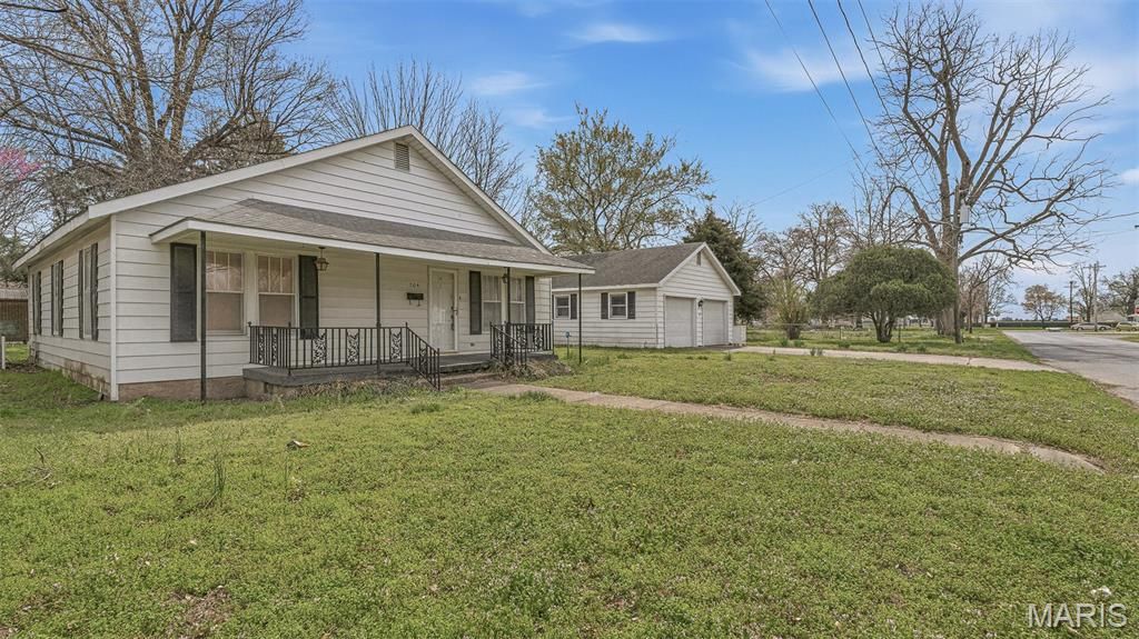 Photo of 704 Park Street, Kennett, MO 63857 (MLS # 26024794)