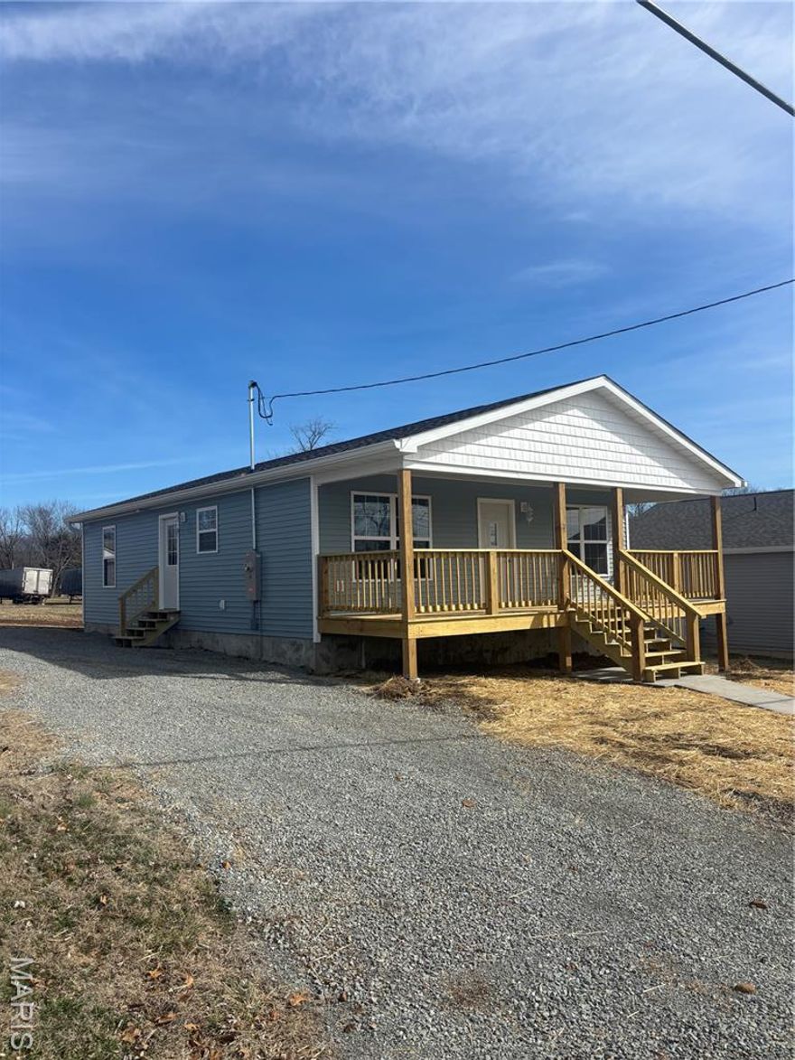 Charming and well-kept 3 bedroom, 2 bath home with a thoughtful layout and modern touches. The kitchen is fully equipped with stove, refrigerator, dishwasher, and microwave and connects seamlessly to the dining room. Durable LVT flooring and ceiling fans enhance comfort throughout the home. A separate laundry room adds convenience, while the front covered deck offers a welcoming outdoor space. Sidewalk access to the street and a side entrance provide added functionality. Ideal for homeowners or investors alike.