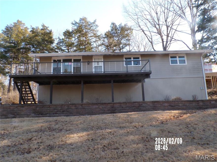 3 Bedroom, 2 bath home with unfinished basement for storage or finish for more living space! This home sits near the Lake of the Ozarks, with a view of the lake and a gentle rolling yard to enjoy the outdoors! This property may qualify for seller financing(Vendee)