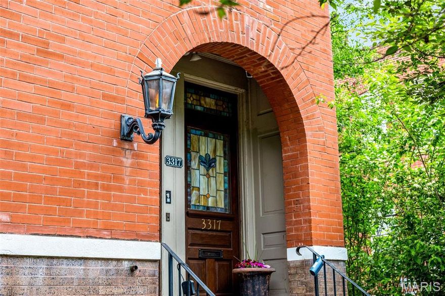 Historic charm meets modern comfort in this 2-bedroom, 2.5-bath  1900 sq ft  single-family home in the highly sought-after Benton Park neighborhood. A stunning double-door entry, 10ft ceilings with stained glass welcomes you inside, where character abounds with pine floors, an open floor plan, two decorative fireplaces, and gorgeous mantels. The spacious eat-in kitchen features a center island and ample pantry space, perfect for everyday living and entertaining. Step outside to a beautifully landscaped, fenced backyard with stone accents and a two-car garage. Upstairs you will also find 10ft ceilings and two large bedrooms, including a primary suite with a walk-in shower, clawfoot soaking tub, and double vanities, plus a private deck overlooking the backyard. The second bedroom also offers double vanities and a tub/shower combo. High end finishes include Grohe faucets and Toto toilets.  Located in a walkable neighborhood near great eateries, this home perfectly blends historic detail with modern convenience. New TPO roof and new furnace.  Passed  city municipal inspection available.