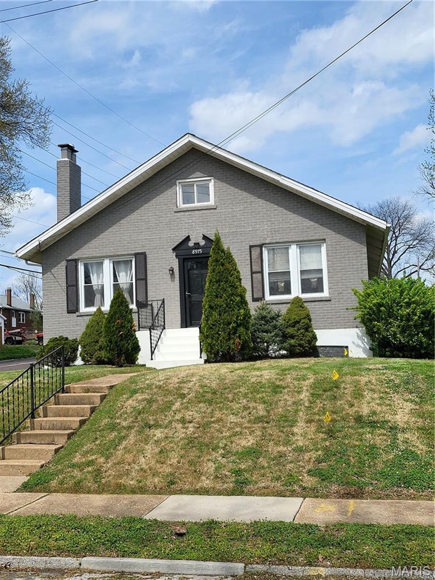 Welcome home to this well maintained three bedroom 1.5 story home, boasting updated kitchen and bath, updated flooring, and extended primary bedroom.  This home sits on a large corner lot, in a walk friendly neighborhood, close to major thoroughfares, shopping, schools and places of worship.  Take notice of the updated kitchen cabinets, appliances and flooring.  Then experience similar upgrades to the bathroom, including flooring, fixtures and vanity.  Did you experience the large living room and formal dining room.  The primary bedroom offers an abundance of space as it is two rooms converted to one large room.  Oh... there's an additional bedroom on the main level as well as a spacious family room.  Upstairs, there's another large bedroom.  While in the basement, notice the updated electrical panel, furnace and water heater.  The all brick exterior is covered by a newer roof.  Did I say... "Welcome Home?"  Don't sleep on this one.  It's a gem!