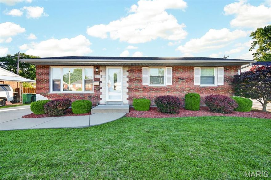 Welcome to this all brick ranch home with great curb appeal! Large window in the living room provides lots of natural light into the open floor plan. You’ll enjoy beautiful wood flooring throughout. Plenty of cabinet space in the kitchen, as well as a pocket door for privacy.  There is also a large pantry for extra storage. The primary bedroom has a half bath, and the remaining two bedrooms are served by an updated bathroom which includes a jetted tub. All of the bedrooms as well as the kitchen have ceiling fans. The lower level recreation area features a custom bar, complete with a wine fridge, beverage fridge and bar TV, all which stay with the home!  A cedar closet and laundry area finish off the downstairs area. In the backyard you’ll enjoy the exposed aggregate patio, fenced level yard and the oversized one car garage. HVAC is only 5 years old. This one won’t last long!