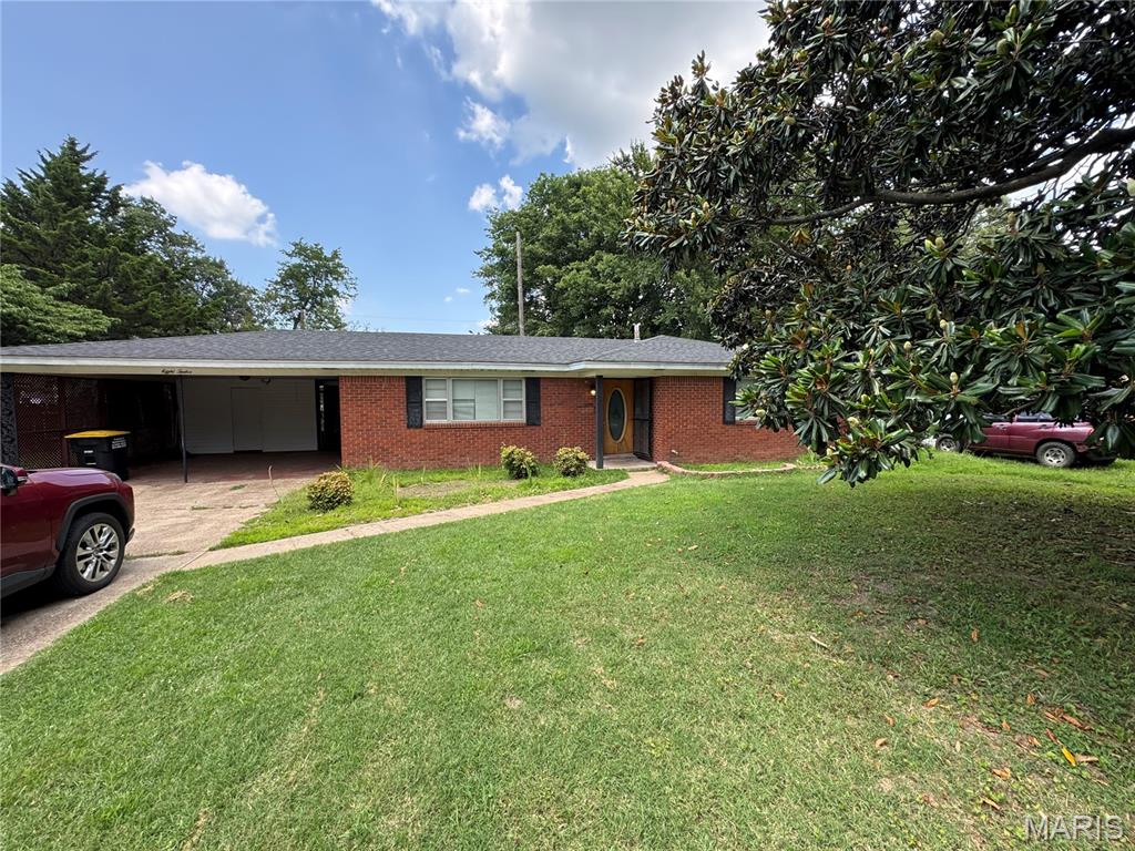 Photo of 812 Hastings Drive, Kennett, MO 63857 (MLS # 26042580)