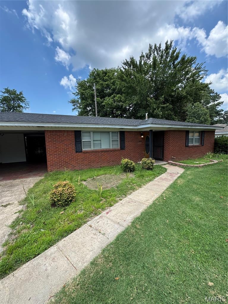 Photo of 812 Hastings Drive, Kennett, MO 63857 (MLS # 26042580)