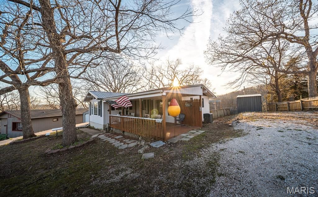 Photo of 28464 Lucky Point Drive, Rocky Mount, MO 65072 (MLS # 26021026)