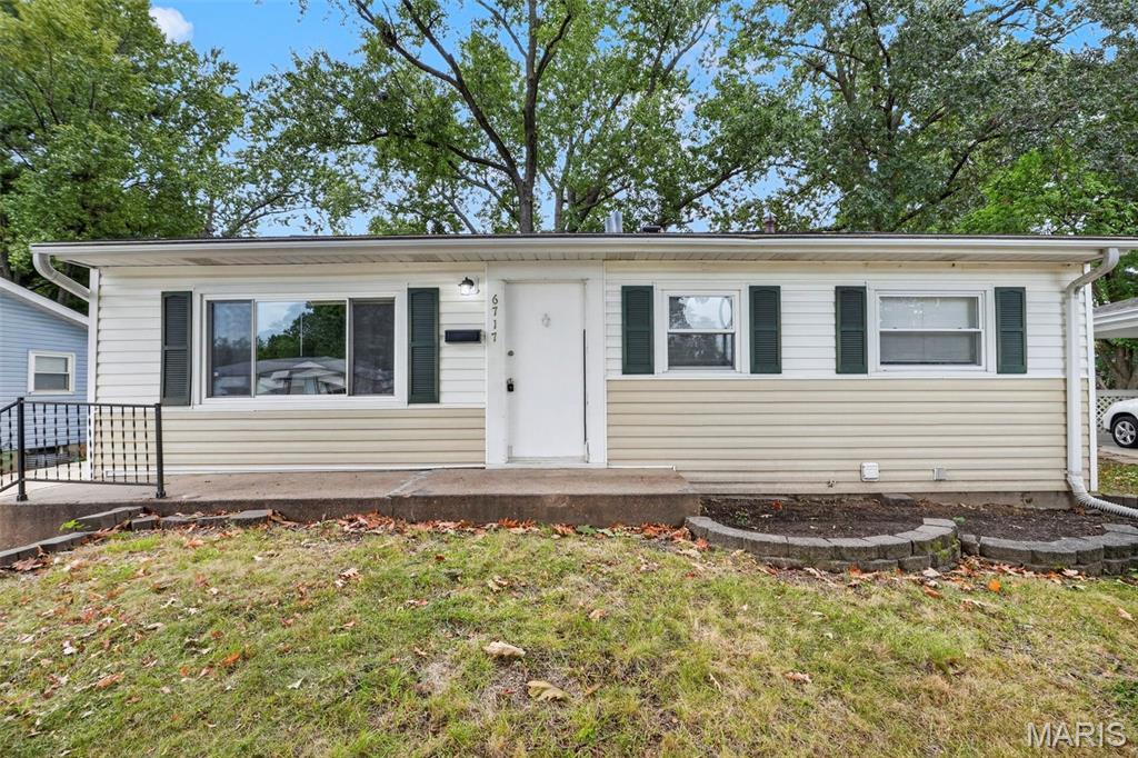 Photo of 6717 Lightwood Drive, Hazelwood, MO 63042 (MLS # 26068100)