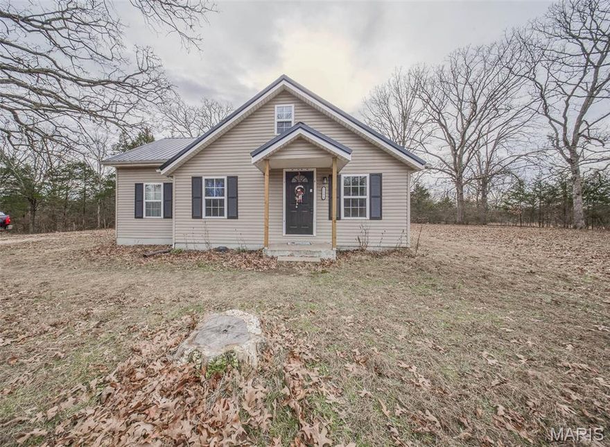 Beautifully updated and full of charm, this 3-bedroom, 1.5-bath cottage sits on a level 0.73-acre lot m/l in Rolla. Natural light fills the home, highlighting luxury vinyl plank flooring throughout and creating a bright, welcoming atmosphere. The spacious living room flows seamlessly into the dining area, perfect for everyday living and entertaining. The kitchen features stylish butcher block countertops and ample workspace.  The lower level includes the primary bedroom, a second generously sized bedroom, a full bathroom, and a convenient laundry room. Upstairs, you’ll find a large third bedroom and a half bath, offering flexible space for guests, a home office, or a retreat. Enjoy the peace and space of the level lot while still being close to town conveniences. Don't miss this opportunity! Schedule your private showing today!