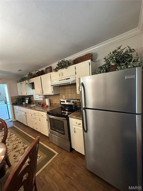 Tiny photo for 504 Virginia St ST, Sikeston, MO 63801 (MLS # 26030308)