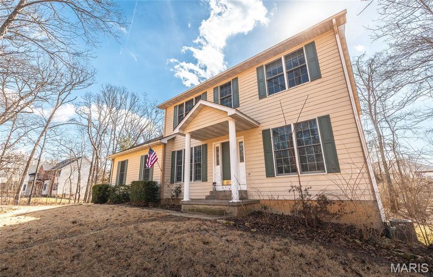 Located in the highly sought-after Oak Knoll Country Estate Subdivision, this home offers convenient access to schools, shopping, dining, and major employers. Just minutes from the Missouri University of Science and Technology and Phelps Health Hospital, the area enjoys steady housing demand from university faculty and healthcare professionals.
Oak Knoll is renowned for its established residences, mature trees, and serene surroundings, all while being conveniently close to everyday amenities and local businesses. Situated on approximately 0.94 acres, the property provides added privacy with wooded views to the rear. The neighborhood features wide streets and a quiet setting. Inside, the home includes four bedrooms plus a main-level office, along with a large unfinished basement offering generous storage. The spacious kitchen flows into the great room, creating an inviting layout ideal for entertaining and everyday living. Portions of the main-floor engineered wood flooring were installed just two years ago.