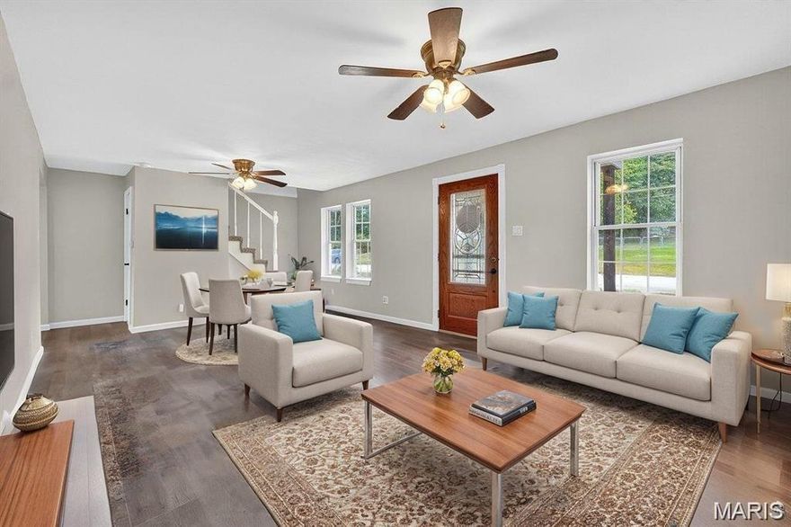 Welcome to this beautifully updated 2-story home featuring 4 spacious bedrooms & 2 full bathrooms. The main level offers a convenient bedroom & full bath ideal for guests or multi-generational living while 3 additional bedrooms & a full bath await upstairs. Enjoy brand new LVP flooring throughout the main floor & fresh interior paint that gives the home a modern, move-in ready feel. The kitchen shines with stainless steel appliances & flows effortlessly into the living & dining areas. Both bathrooms have been tastefully updated with contemporary finishes. Major mechanical upgrades include a new furnace (2022) & HVAC system (2023) for year-round comfort & peace of mind. Step outside to a fully fenced backyard with a 6-foot privacy fence perfect for pets, play, or relaxing. Don’t miss this stylish and functional home schedule your showing today!