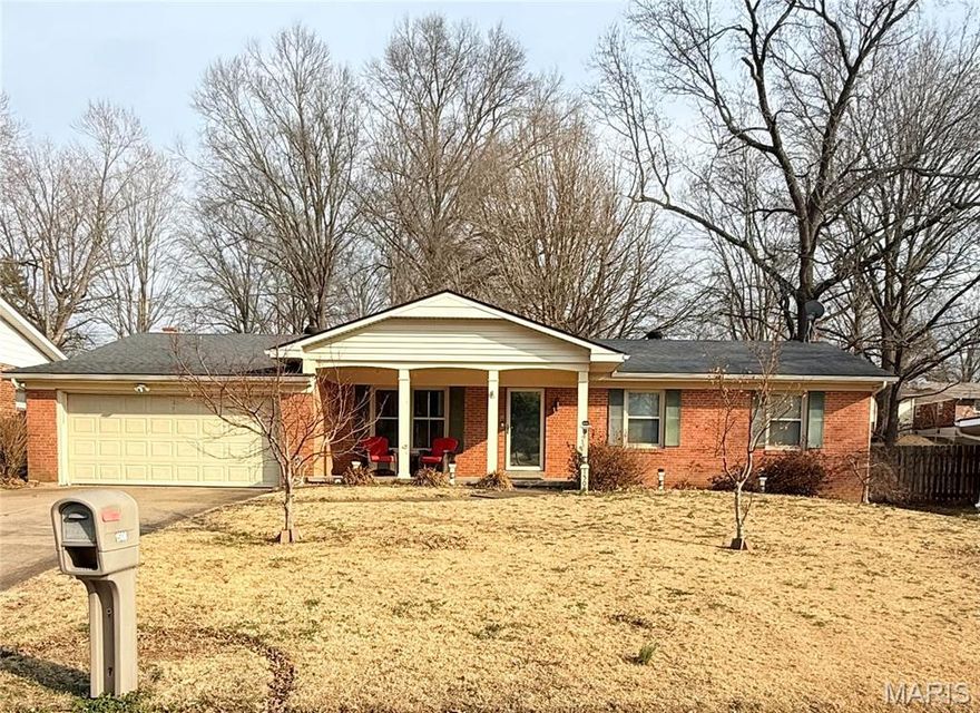 Welcome home to this well-maintained two-bedroom charmer, lovingly cared for by only two families! The spacious primary bedroom offers a walk-in closet with easy access to the full bath. Relax in the cozy hearth room featuring a woodburning fireplace—perfect for quiet evenings at home—and enjoy a well-appointed kitchen with durable Corian countertops. The basement is already plumbed for a future bathroom, offering excellent expansion potential. Step outside to a beautiful backyard shaded by a mature ginkgo tree. Conveniently located near schools, parks, shopping, and dining, this move-in ready home reflects true pride of ownership.