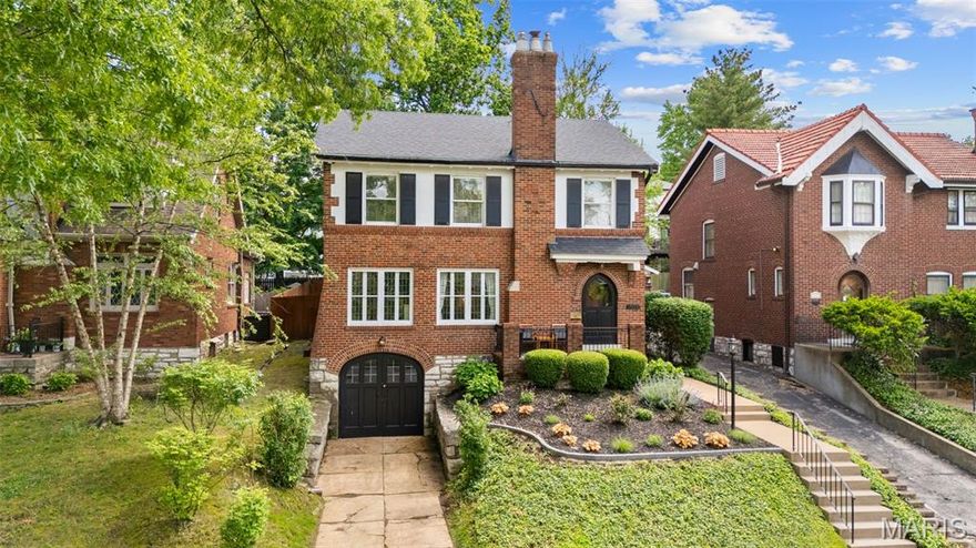 Open Sun 1-3p. Exceptional Alta Dena home just steps from Clayton! Gorgeous hardwoods throughout, arched doorways, jaw-dropping leaded glass & a story-book location w/mature treelined streets in this prominent U-City neighborhood. Main floor features spacious living rm w/gorgeous fireplace; sunroom w/original tile flooring; spectacular dining rm w/2 sets of French doors; 1/2 bath; & a delightful family rm w/walk-out to the Zen backyard oasis. Renovated kitchen w/white shaker cabinetry, state of the art appliances, Carrara marble backsplash, Caesarstone counters & Pottery Barn Hardware is a true masterpiece. Equally impressive 2nd fl offers 4 beds, including a large primary w/his & her closets; and a spa-like bath w/dual vanity, glass enclosed shower/tub & plenty of storage.  Clean unfinished basement w/laundry area, 1/2 bath & front entry tuck under garage. Outdoor enthusiasts will appreciate the professional landscaping; charming front porch; and lush backyard w/paver patio, firepit & privacy fence.