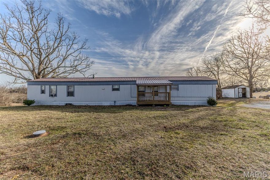 This three bedroom, two bathroom home sits on 5.39 acres and sits in the heart of Stoutland. This property has everything you need to start your hobby farm, would make a perfect first time home, be an incredible investment to add to your portfolio, or a place to build your forever home! This property has endless possibilities and is just waiting for YOU!