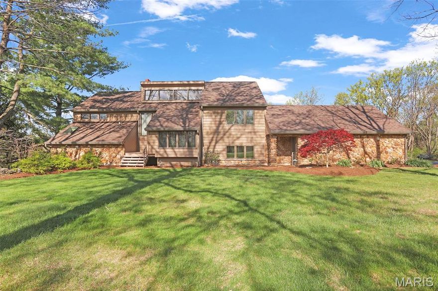 Spectacular sunsets for this one of a kind custom home on gorgeous lot in Labadie. It will take you one visit to see how unique this place is with the soaring cathedral ceilings wrapped all in wood, great room overlooks stunning views, water fountains, hot tub which stays, massive deck, & gorgeous patio! Walk right in to massive stone fireplace and a wall of doors and windows. Oak hardwood floors keep this vibe going into big country kitchen w updated Cherry cabinets, double granite countertops and lots of cooking essentials. Primary bedroom is huge with fireplace, newly updated gorgeous tiled walk in shower and big walk in closet. There is a generous main floor laundry with half bath. Upstairs finds two more bedrooms, two full baths and lots of room. Plus a large office/workout/playroom space! Entering the lower level you will find another kitchen, aquarium, half bath, additional fireplace and more. This will lead to sliding doors and such privacy it's hard to explain with waterfalls, rock formations, beautiful plants, and sunsets! Big garden in rear, Bocce Ball Court and plenty of room for a pool as septic has been thought out carefully for this purpose. This area of established homes close to Washington, 3 minutes to Labadie and such nice homes rarely offers home sales. This lot in particular has soaring pine trees, exquisite privacy, and the home has been meticulously maintained and upgraded with an extra garage/outbuilding, greenhouse, pull in your trailer, boat or tractors right here. This is a custom home with one owner, well loved and it shows. All in enchanting private, quiet Labadie! Quality materials here. Feature sheet and optional list available in this listing.