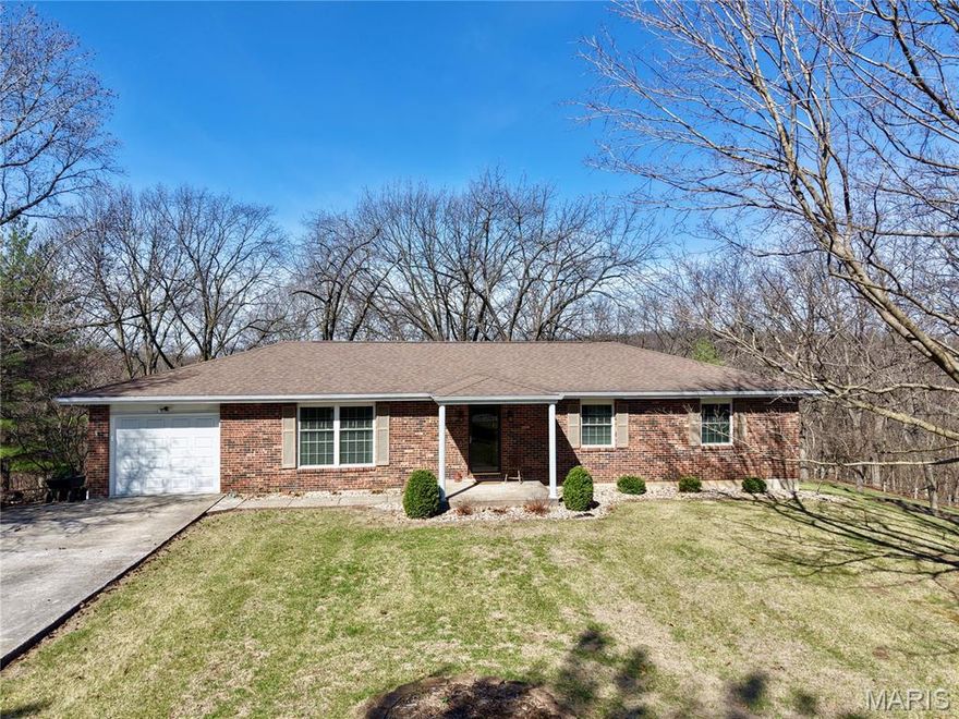 Welcome to this beautifully maintained brick ranch situated on 5.71 acres, offering privacy and space with no restrictions. Backing to acreage owned by Continental Cement, this property provides a peaceful setting with room to enjoy the outdoors.
The main level features 3 bedrooms and 2 bathrooms, including an updated primary suite with a walk-in shower. The kitchen has been tastefully updated with custom oak shaker cabinets that extend to the ceiling, offering both style and functionality.
The finished basement expands your living space with a cozy gas log fireplace, a large family room, kitchenette, and two additional sleeping rooms. A full third bathroom and laundry area make this lower level ideal for guests or extended living.
Additional updates include new windows and doors (2018) and an efficient geothermal system.
Outside, you’ll find a charming A-frame playhouse and a garden shed, perfect for storage or hobbies. Whether you're looking for space, privacy, or flexibility, this property offers it all.