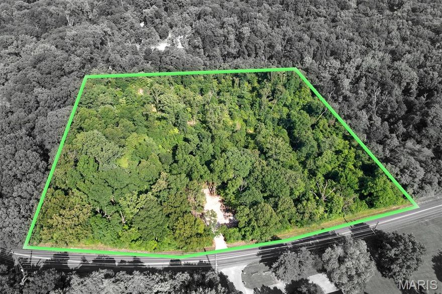 Tract# 2 of this newly split acreage for residential development consists of a 4.33+/- acre urban timbered residential building lot, but with the country feeling of privacy & seclusion.  Located with an entrance off W Cape Rock Rd, this exclusive upscale property has some limited deed restrictions to maintain its long-term upscale integrity.  Just outside of the Cape Girardeau city limits, the property provides direct access from the paved roadway, but is in a natural state and ready for excavation and home construction for whatever a Buyer envisions for their dream home property.  With varying topography throughout, there are also potential areas for pond excavation.  As a restricted hunting area, the wildlife viewing is spectacular.  This acreage sees an abundance of whitetail deer and much other wildlife that frequent the area.  This amazing timbered estate home tract places you just minutes from the Downtown Cape Girardeau Riverfront business district, and shopping amenities that the city offers.