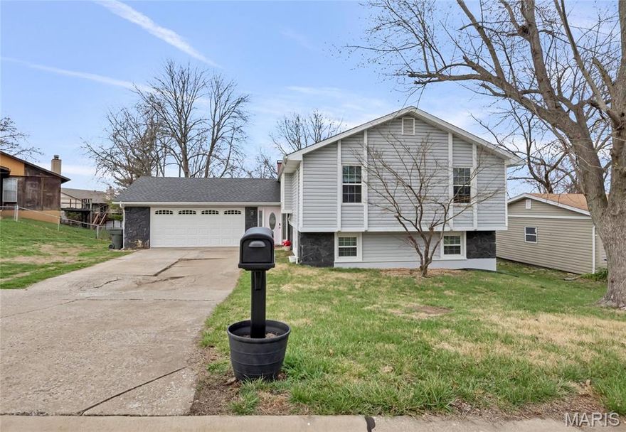 Welcome to your beautifully updated home in one of St. Peters’ most desirable neighborhoods! This split-foyer design offers the perfect balance of space, function, and multiple updates throughout. Upstairs you’ll find three freshly painted spacious bedrooms, including a primary suite, plus two full baths. The open-concept living room with hardwood floors flows into the kitchen featuring stainless steel appliances. The lower level is a perfect retreat with an additional bedroom and a large in-suite bathroom — ideal for guests or a private office. A second living room anchored by a cozy wood-burning fireplace and wet bar makes this level great for entertain. For the people who love spending time outdoors the two large decks with gazebos and large patio offer a great place to Barbecue and spend time with family and friends! Located in a quiet, established neighborhood with mature trees and easy access to parks, shopping, and top-rated schools. With 4 bedrooms, 3 bathrooms, two living spaces, and great outdoor space, this home is truly move-in ready schedule a showing today!