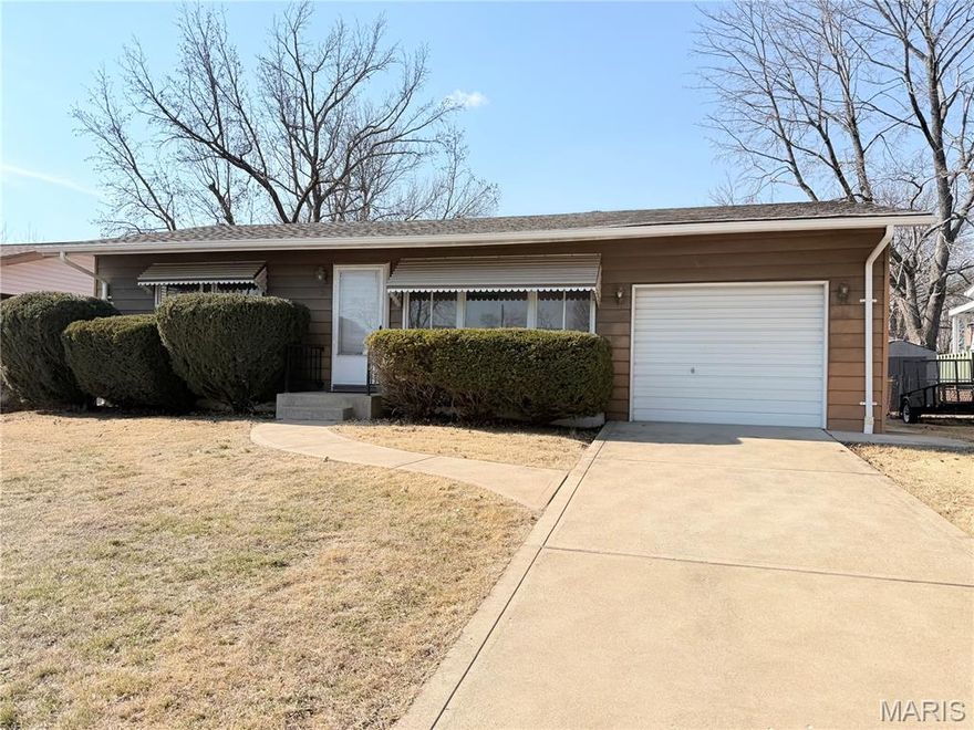 Location is key! This fixer upper is tucked away on a quiet street within the sought-after Lindbergh School District. This 2 bedroom ranch home is the perfect investment opportunity for quick equity. The home features a spacious living room with hardwood floors and retro-style eat-in kitchen complete with vintage metal cabinets. Down the hall are two comfortable bedrooms, each with hardwood floors, and a full bath. The lower level provides great storage and a large family room area with tons of potential. Walk out from the kitchen to the covered patio overlooking the large, partially fenced backyard. The oversized one-car attached garage is a huge bonus. Home is being sold as-is; cash, rehab, or conventional financing only. There are no disclosures available and seller will not provide any warranties or inspections, including municipality.