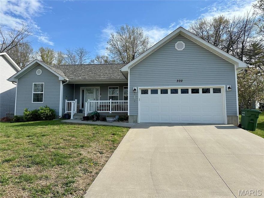 Looking for a place that feels just right the moment you walk in? Say hello to this 2 year old light-filled open floor plan. Split bedrooms with a large primary bedroom and bath with a step-in shower on one side of the Great Room and 2 bedrooms and bath on the other side. The kitchen features white cabinetry with granite countertops, stainless appliances, an island with a gorgeous stained wood top and plenty of room for a nice size table.  This is definitely a home to see!