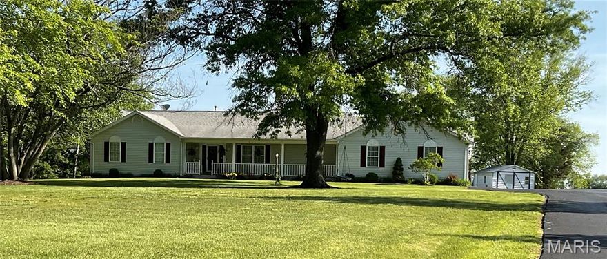 NOT IN A SUBDIVISION, NO INDENTURES OR RESTRICTIONS!!!! NEW ROOF.
This is a must see!!!  This beautifully updated, well maintained home with 3 beds, (3) full (2) 1/2 baths is on 10 flat acres. Primary bedroom has a bay window, separate shower/jacuzzi tub. Family room has a wood burning fireplace. Relax on the covered porch that overlooks a water feature and the lake. Kitchen has granite countertops, propane cooktop, double ovens. double sink, microwave and refrigerator.  Lower level has another open bedroom with a full bath. 40x60 open span outbuilding with 14x60 lean two. Oversized garage with Epoxy floor. Propane tank owned. Perfect for a gentlemen farm or horse ranch. With minutes to Hwy 40/61. Convenient for shopping in Winghaven and Hwy N/40. New Melle, Augusta and Defiance are also minutes away.