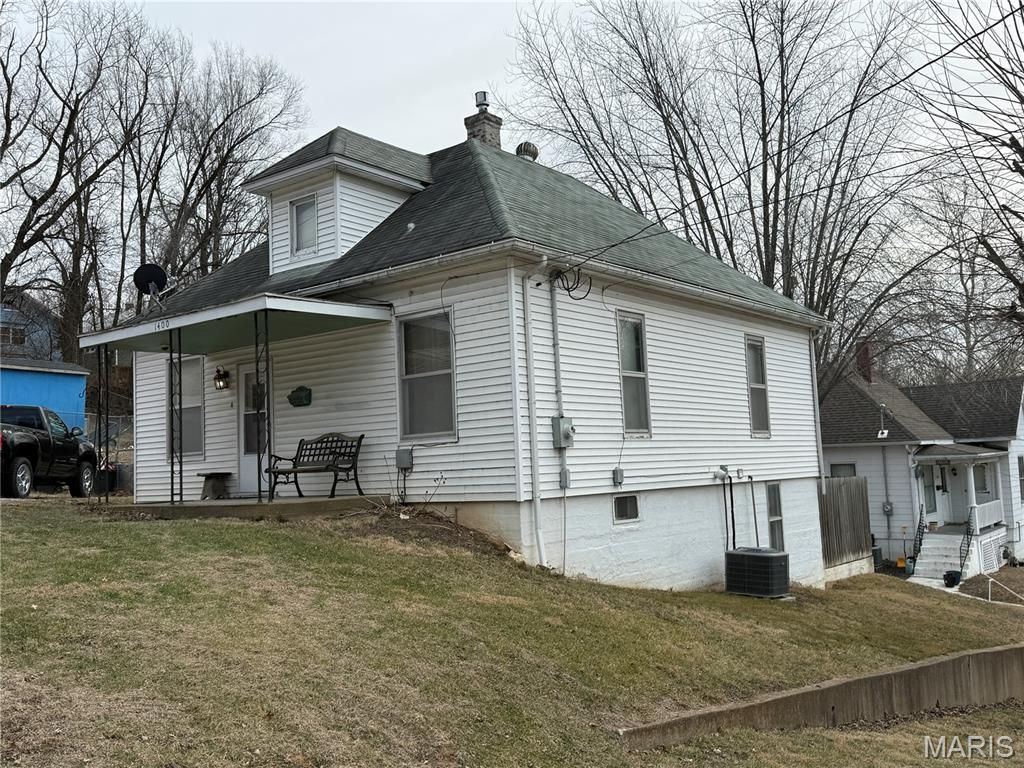 Photo of 1400 Walnut Street, Hannibal, MO 63401 (MLS # 26004168)
