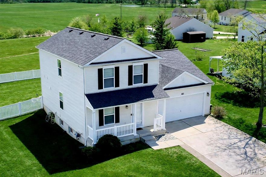 Meticulous 3-bedroom home with a finished basement in the Crooked Creek Estates neighborhood!  This home features a newer architectural shingled roof, and new paint and flooring throughout!  The main level features new laminate flooring, laundry room, a large family room, eat-in kitchen and powder room.  The main floor master bedroom features a walk-in closet and en-suite bathroom.  The second level features new carpeting, 2 additional large bedrooms and a spacious loft!  The finished basement boasts a powder room, new laminate flooring throughout the huge recreation room and built-in bar...perfect or entertaining!  The spacious backyard adjoins to greenspace and is fully fenced-in and is ready for you to enjoy!  Ideally located just minutes away from HWY 40/61, this one won't last long!