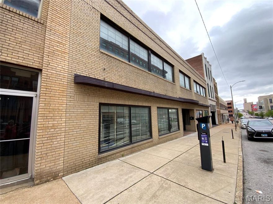 Available for sale is a two-story, 9,928-square-foot multi-tenant building constructed in 1946 that has been converted into three condo units. The building features two ground-floor units and a potential loft or creative space on the second floor. 

**1710 Olive** is a ground-floor unit with approximately 2,087 usable square feet. It measures 32 feet by 64 feet and has an 11-foot ceiling. This space includes a drive-in door that provides access to the rear alley. It is a "raw" space, ready for redevelopment.

**1714 Olive** is the other ground-floor unit, offering around 2,123 usable square feet. This space was previously occupied as a medical clinic.

**1712 Olive** is located on the second floor and is a loft comprising approximately 4,606 square feet, with interior dimensions of 70 feet by 65 feet. While this space would be ideal for a residential loft, it is currently leased to a fencing club as a sports practice facility. Location: City, Downtown