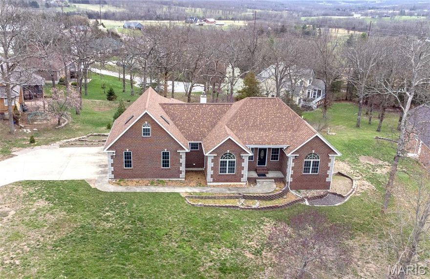 Welcome to one of the most sought after neighborhoods in Rolla, Missouri - 10558 Limestone Lane in The Quarry! This is a 5 bed/3.5 bath ranch home with 9 foot ceilings and a split bedroom floor plan. Kitchen has gas range and oven, large pantry, desk set up, informal dining and access to the covered deck. There is a formal dining space as well for entertaining. The large master is just off of the kitchen area and garage. It has a nice walk-in closet and an en-suite with a jetted tub, stand alone shower and double vanity. There is also what some have called a hidden Harry Potter room, which is a spiral staircase up to a large office just above the garage...full of light from multiple skylights. The basement has a large family room with a fireplace, 2 additional bedroom/office and a full bath. The home has full exposure across the back. The backyard has great flower gardens and a spot perfect for a hot tub. This home is ready for your finishing touches. Call to set up your showing now!