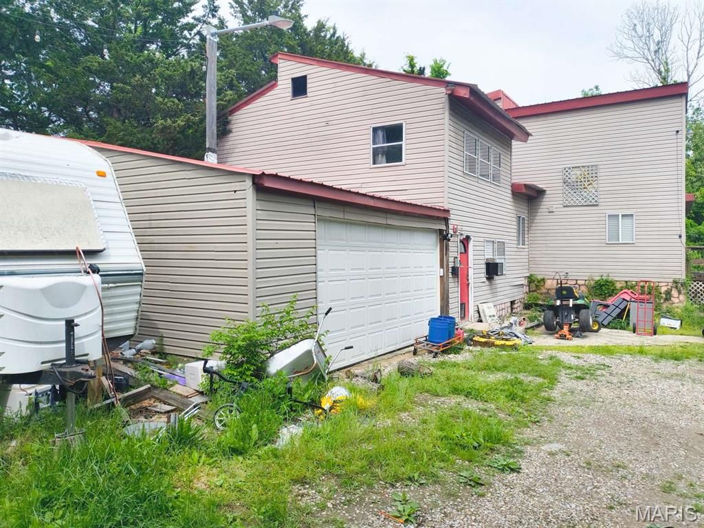 Photo of 11360 County Road 4012, Holts Summit, MO 65043 (MLS # 26026652)