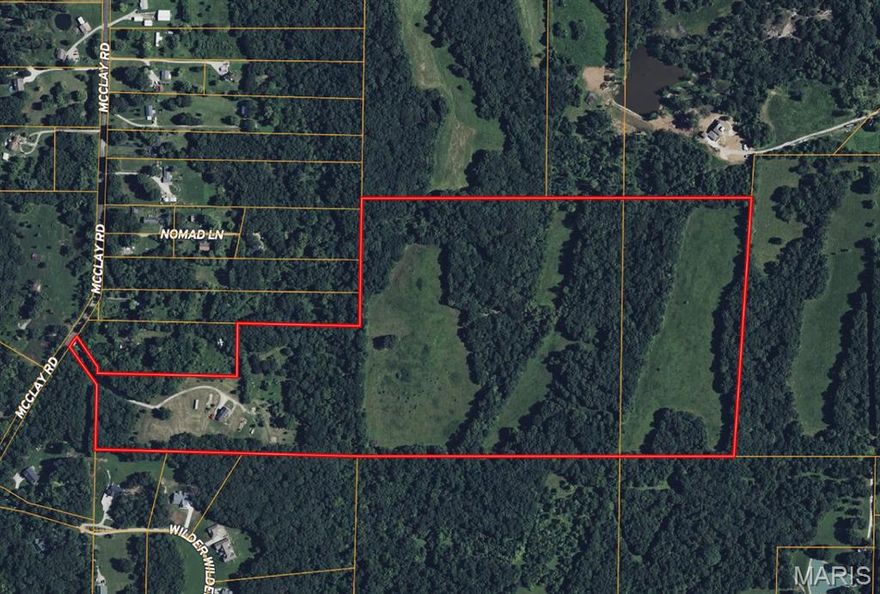 This property has investment written all over it. 80 acres. NO RESTRICTIONS. 20 minutes East of Troy, MO. Private drive. 3 bed, 2 bath mod. home with full walk out basement. Above ground pool. Private State Licensed Wastewater Treatment Plant. 8 Mobile Home Pads, equipped with individual water, sewer and electric hookups. Behind the home acreage opens up to the back 60 partially wooded, partially open ground. No current tenant farm agreements in place. Ideal for Residential, Commercial or Recreational Development - May divide.