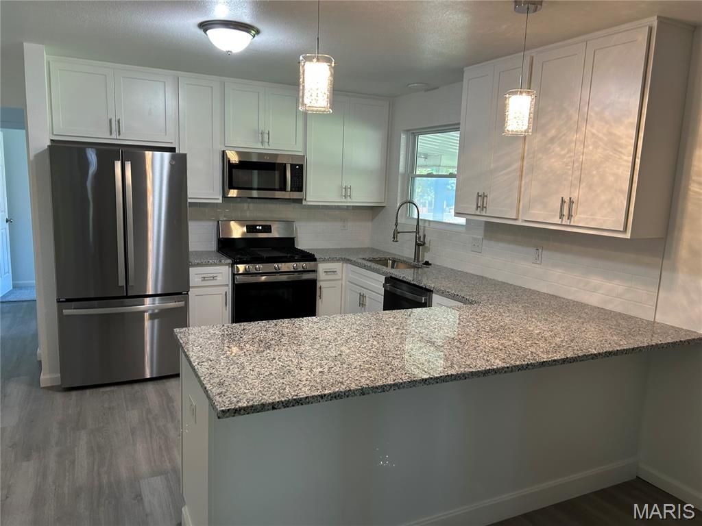 Photo of 763 Wagon Ridge Drive, Fenton, MO 63026 (MLS # 26025352)