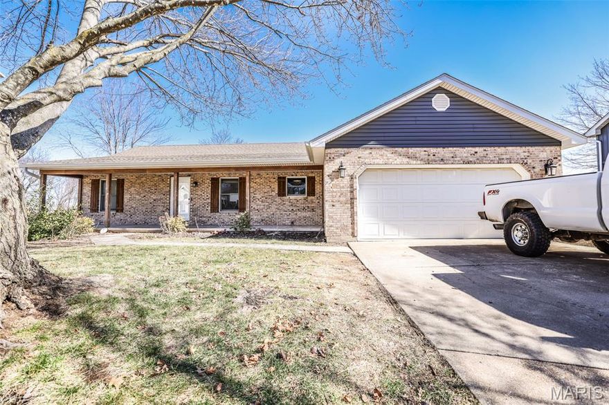 PRICE DROP ALERT & MOTIVATED SELLERS!  VERY NICE move-in ready ranch home located in Washington, MO! This home offers an open floor plan with a Beautiful gas brick fireplace w/ blower fan in living room for all your cozy nights. Other features include vaulted ceilings in living room. Divided bedroom floorplan with two nice sized bedrooms shared with a full bath. Large master suite has 2 closets & full bath tub/shower combo and also walks out to the Newly Built no maintenance composite deck. Mud room/laundry room is located between kitchen & garage.
Newer stainless steel appliances compliment the kitchen, updated bathrooms, paint & flooring thru out on main level. Unfinished walk out basement has a rough-in bath and lots of space for additional living area. Home is located in a very nice development & has Great curb appeal with large covered front porch located on a quiet cul-de-sac & walking distance to St. Francis Borgia HS along with close proximity to the riverfront, parks, bike trails, shops & restaurants. DON'T MISS THIS SUPER CUTE HOME!