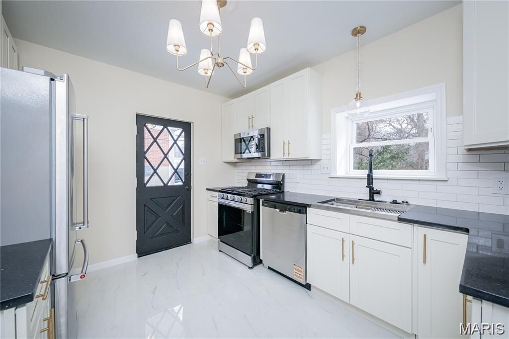 Photo of 7824 Rosedale Drive, St Louis, MO 63121 (MLS # 26012600)