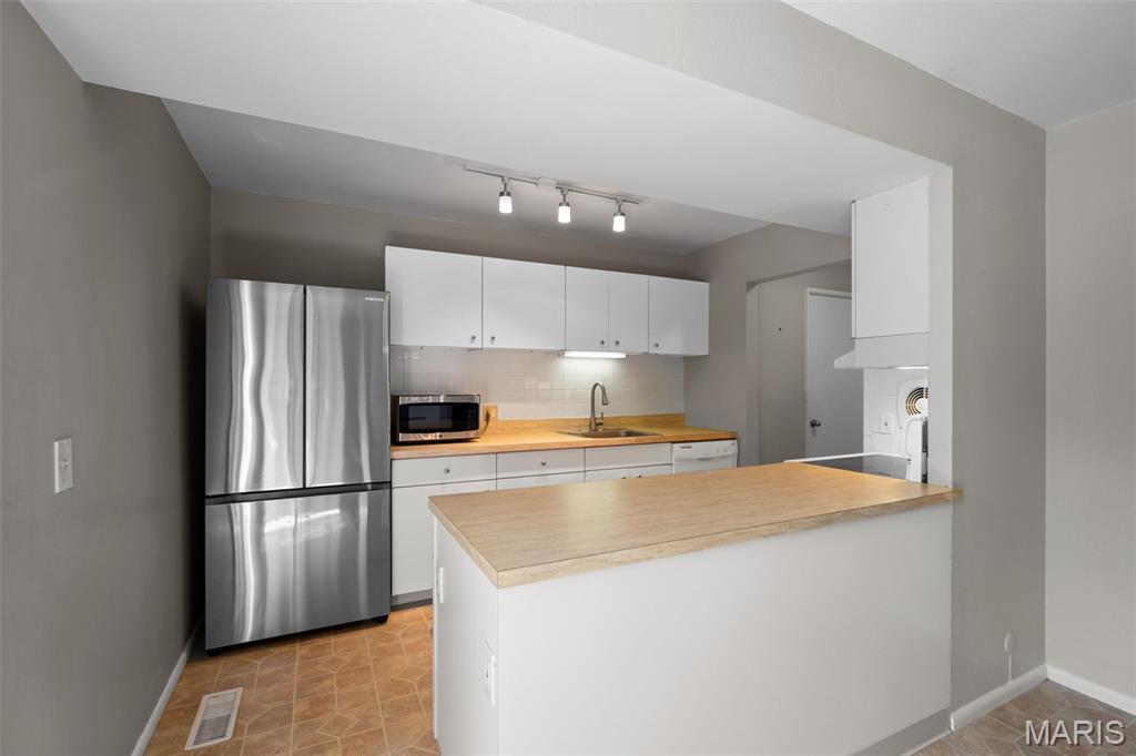 Beau Jardin Townhomes & Condos - Residential