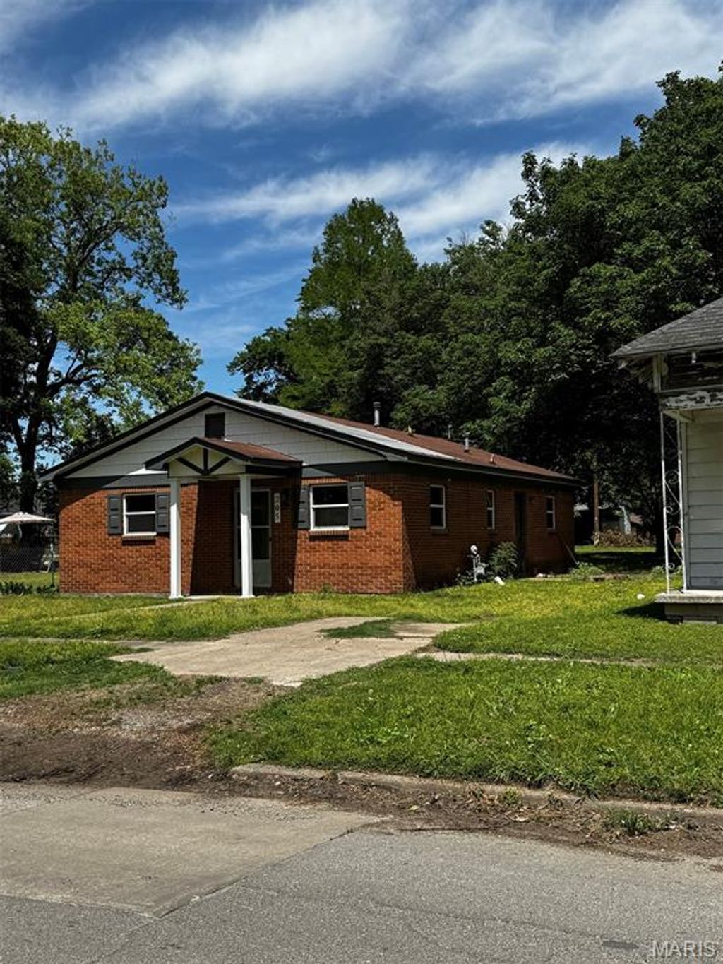 Photo of 205 E 9th Street, Caruthersville, MO 63830 (MLS # 26029629)