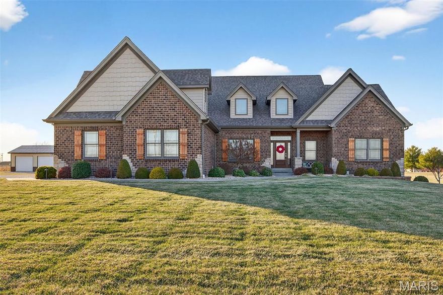 Welcome to your own private retreat on almost 9 acres of picturesque, country living with exceptional amenities and thoughtful design throughout. This custom built residence offers generous living space, premium finishes, and multiple outbuildings — perfect for relaxed everyday life and large-scale entertaining.
Step inside to discover a spacious floor-plan highlighted by a split bedroom layout, impeccable craftsmanship, and versatile living areas. The heart of the home features a chef’s kitchen with a walk in pantry and a mini bar adjacent to the kitchen — ideal for gatherings and casual entertaining. The impressive primary suite offers an oversized walk in closet and luxury bathroom with walk in shower and double vanity.  
The secondary bedroom suites include a Jack & Jill bathroom, walk-in closets, and a walk-in shower for comfort and convenience.  Don't miss the rec room above the garage.  Downstairs, the home includes a safe room and service stair access directly to the garage, adding convenience and peace of mind.  The ultimate relaxation takes place in the  inground, saltwater, heated pool, with insulated cabana featuring a wood burning fireplace, half bathroom and outdoor bar. The covered patio is equipped with a built-in Blackstone cooktop, ice machine and refrigerator. 
Enjoy making memories at the fully stocked heart-shaped pond, whether fishing or paddle boating — your own private oasis is just steps from the back door. 
For the hobbyist or car enthusiast, this property offers a heated and cooled outbuilding with concrete floor and half bathroom as well as an equipment shed with concrete floor and electric.  Home systems include a whole-house water softener, whole-house humidifier, and whole-house surge protector, plus separate well and septic systems for efficiency and reliability. 
This exceptional property blends comfort, convenience, and country lifestyle — all within a short drive to amenities and entertainment. Schedule your private tour today and experience all that 2745 North Cappel Rd. has to offer!