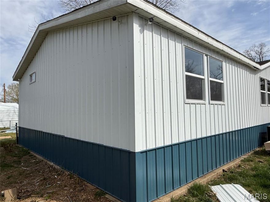 Investor special! 5 bedroom, 2 bath home in the country with major renovation progress already underway. Nearly all materials needed to complete the project are on site, saving time and upfront costs. Sitting on 2 +/- acres with 350 feet of creek frontage, this property offers strong potential for a flip, rental, or custom finish.