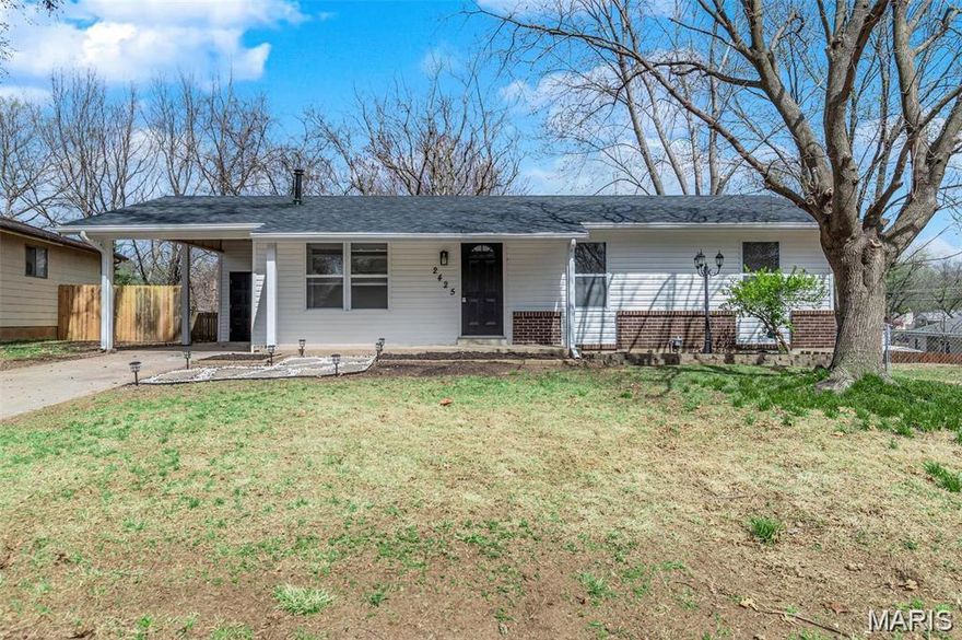 Beautifully renovated 3-bedroom, 1-bath ranch packed with upgrades inside and out! The exterior features newer siding, roof, gutters, soffit, and fascia, along with a fenced backyard, patio, and a large storage shed located in the carport for added convenience. Step inside to luxury waterproof vinyl flooring that flows throughout the main level. The bright living room features a large picture window and a stunning gas fireplace and a stylish shiplap feature wall, creating a warm and elegant focal point. The fully remodeled kitchen showcases stainless steel appliances, newer white cabinetry with modern hardware, a newer added dishwasher, and a sleek three-way dining room light. Atrium doors off the kitchen provide easy access to the backyard—perfect for entertaining. The bathroom has been beautifully updated with modern finishes and white cabinetry. Additional updates include newer windows with blinds and fresh paint throughout. The finished lower level offers additional living space with a spacious recreation and family room area, complete with recessed lighting, drywall, plush carpeting, and painted ceilings for a trendy loft-style feel. Major exterior updates and stylish interior improvements throughout, this move-in-ready home offers comfort, style, and space both inside and out.