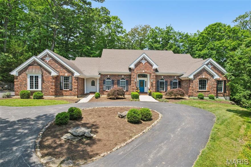 Welcome to your private retreat nestled on three peaceful, wooded acres in the heart of Wildwood, Missouri. This one-of-a-kind, one-owner estate offers the perfect blend of luxury, comfort, and nature—just minutes from top-rated Lafayette Schools and all the conveniences of West County.

This spacious home features five bedrooms and six bathrooms, including four private en-suites, providing ideal accommodations for family, guests, or multigenerational living. You'll find hardwood floors throughout, brand-new carpet, and fresh paint from top to bottom—making this home truly move-in ready.

Enjoy three cozy fireplaces throughout the main living spaces and lower level, creating inviting areas to gather and relax. The finished walk-out basement is an entertainer’s dream, complete with a full second kitchen, a bar area, and impressive nine-foot ceilings that make the space feel open and bright.

Step outside to your own wooded paradise. Surrounded by mature trees and natural landscaping, this private and tranquil estate is perfect for those who crave peace and privacy, yet want to stay connected to the amenities of suburban life. An oversized three-car garage and circle drive add convenience.

Don’t miss this rare opportunity to call this tranquil Wildwood estate your home.

Schedule your private showing today!