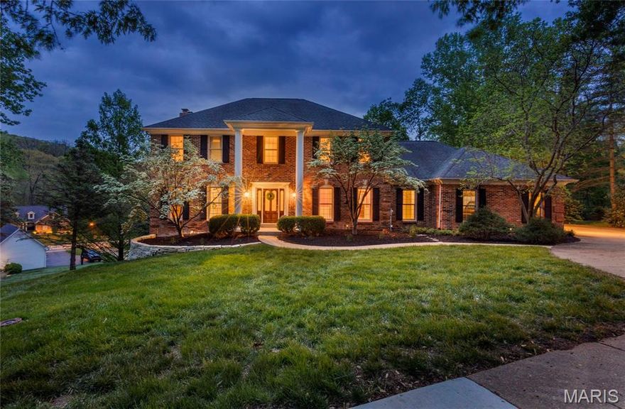 Gracefully positioned on an expansive, estate-sized lot of over half an acre, this exceptional residence delivers a true executive-level lifestyle defined by privacy, sophistication, and impeccable design. Surrounded by lush, manicured landscaping and enhanced by a full irrigation system, the setting offers both grandeur and tranquility. Inside, a light-filled interior unfolds with soaring ceilings, expansive windows, and rich hardwood floors, creating a refined yet inviting atmosphere. Elevated architectural details, custom millwork, and thoughtfully curated finishes enhance every space. The designer chef’s kitchen serves as the centerpiece of the home, showcasing premium designer appliances, a statement island, and elegant appointments tailored for both everyday living and high-end entertaining. The residence offers 5 spacious bedrooms and 4 luxurious baths, including serene retreats with walk-in custom closets that evoke a boutique dressing experience. A finished walk-out lower level provides a versatile extension of the home—ideal for entertaining, recreation, or hosting guests in style. Main floor laundry adds convenience, while a 3-car garage accommodates both storage and lifestyle needs. Engineered for comfort and efficiency, the home features zoned Lenox HVAC for personalized climate control throughout. Every detail has been carefully considered to deliver a seamless blend of form and function. Perfectly situated within an award-winning school district and just moments from upscale shopping, dining, and entertainment, residents also enjoy access to exclusive neighborhood amenities, including a pool and community features. This is a rare offering—an executive estate where luxury, scale, and location align to create an extraordinary living experience.