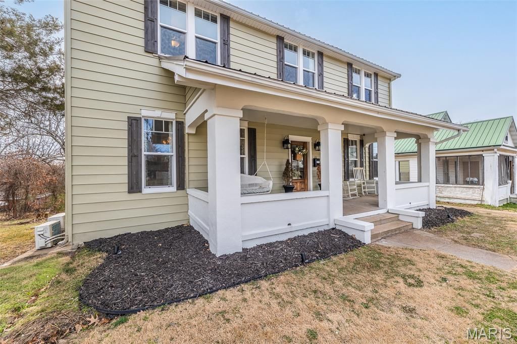 Photo of 938 Poplar Street, Poplar Bluff, MO 63901 (MLS # 26003735)