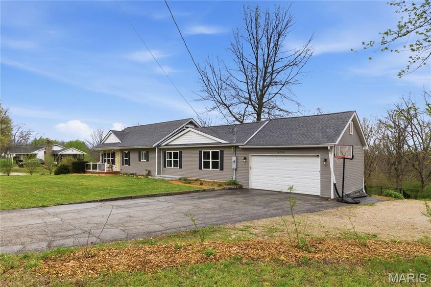 Welcome to this beautifully maintained 4-bedroom, 4-bath home set on 3 acres, offering the perfect mix of space, comfort, and flexibility. From the moment you walk in, you’ll notice the warm flooring with a blend of gray and brown tones that flows throughout the main living areas.

This home features four full bathrooms with elegant custom tile work and two primary suites—one on the main level and one upstairs—providing flexibility for guests or multi-generational living. The kitchen is designed for both function and style with white cabinetry, soft-close hinges, granite countertops, stainless steel appliances, and a breakfast bar that opens to the family room, creating a seamless flow for everyday living.

The huge walk-out basement is fully finished and features nice new floors, creating a versatile space for entertaining, a home theater, or a game room. With plenty of natural light and easy access to the backyard, this lower level expands your living area and offers endless possibilities to make it your own.

Step outside to enjoy the huge deck—perfect for morning coffee or evening relaxation—overlooking 3 acres of land complete with a dedicated vegetable garden space - 13 raised garden beds and a chicken coop—perfect for enjoying fresh veggies, eggs, and outdoor living.

Located in the De Soto area with convenient access to State Road E and Highway 21, connecting you to shopping, dining, and everyday essentials. Nearby outdoor recreation includes Washington State Park, local parks and trails, and the De Soto city center, with grocery, retail, dining, and coffee options all within easy reach.