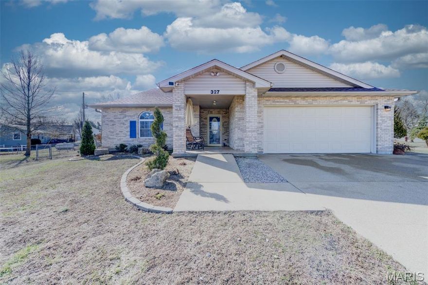 Nestled at the end of a quiet cul-de-sac, this beautifully maintained home offers comfort, elegance, and thoughtful design throughout. A welcoming porch and entryway open to a spacious foyer, setting the tone for the light-filled interior.

This 3-bedroom, 2 full bath residence features a desirable split-bedroom layout with step-in showers for ease and accessibility. A tasteful combination of ceramic tile and plush carpeting enhances both style and comfort.

The kitchen is a true centerpiece, showcasing abundant oak cabinetry, granite countertops, generous prep space, and a convenient breakfast bar. The adjoining family room impresses with a tray ceiling and ceiling fan, creating a warm yet refined gathering space.

Retreat to the serene primary suite featuring another extraordinary tray ceiling, ceiling fan, abundant natural light, and beautiful windows. The spacious walk-in closet provides excellent storage, while the luxurious primary bath offers granite countertops, dual sinks, and ample space to unwind. Secondary bedrooms are generously sized, each with abundant natural light and ample closet space.

Enjoy year-round relaxation in the expansive four-season sunroom, surrounded by panoramic windows that fill the space with natural light — perfect for morning coffee, reading, or peaceful evenings overlooking the backyard.

Additional highlights include a convenient main-floor laundry room with sink, HVAC and water heater discreetly located in a hall closet, and an oversized two-car garage with insulated door. Just steps from the sunroom, a charming portico leads to the large backyard featuring raised flower beds and a playground gym — ideal for outdoor enjoyment.

This exceptional property combines elegance, comfort, and functionality in a truly desirable setting.
Conveniently located near local favorites including Heartland Farms, RS Ranch horseback riding, Half-Crocked Antiques, Bourbon Café & Coffee Saloon, Old Road Craft Spirits, and scenic outdoor recreation at Blue Springs Creek and Huzzah Conservation Areas.