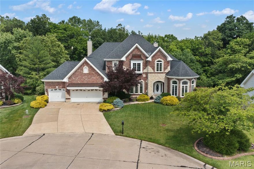Welcome to 835 Snowberry Ridge Drive.  A stunning 5-bedroom, 6-bath estate nestled on a quiet cul-de-sac in one of O'Fallon’s most desirable neighborhoods. Boasting over 6,000 square feet of luxurious finished living space, this impeccably maintained home offers a perfect blend of elegance, comfort, and functionality.

Step inside to soaring ceilings, rich hardwood floors, and custom millwork throughout. The heart of the home features a chef’s kitchen with premium appliances, an oversized island, and seamless flow into the inviting family room with a stately brick fireplace. The main level also includes a sophisticated home office and a serene primary suite with a spa-inspired ensuite bath.

Upstairs you'll find generously sized secondary bedrooms each with bathroom on-suites and a spacious walk in closet. As well as an additional bonus room. The finished walkout basement has 9 foot ceilings and offers versatile entertaining space with a full bar, recreation areas, and additional guest quarters.

Outside, your private oasis awaits with a resort-style pool, expansive patio, and lush landscaping surrounded by mature trees for privacy and serenity.

Additional highlights include 2x6 construction, an oversized finished 3-car garage, formal dining room, updated laundry room, and thoughtful architectural details throughout.

This executive home is truly one-of-a-kind—offering the ideal setting for entertaining, relaxing, and making memories.