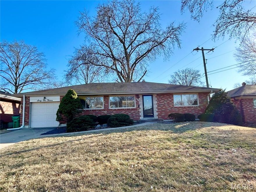 Beautifully remodeled all brick home in a fantastic neighborhood! 3 BR, 2 1/2 bath. Finished basement. Garage. So many updates! Completely new kitchen: Cabinets, island, hardware, new quartz counters, backsplash, lighting, stainless appliances. All bathrooms have been beautifully updated. Hardwood flooring in bedrooms. New LVP throughout main floor living areas. Fresh paint throughout. New lighting. HUGE finished basement w/ new carpeting, lighting, paint, remodeled half bath.