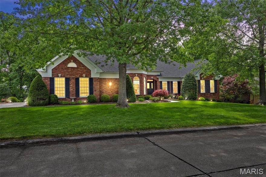 Welcome to 26 Windcastle Drive, sprawling atrium ranch in the prestigious Wind Castle subdivision. Expansive home offers 4 bedrooms, 4 full and 2 half baths, with 3,480 sqft on the main level and 2,000 sqft finished in the walkout basement. Set on a beautifully landscaped, private lot with mature trees and stamped concrete patio, the mostly brick exterior and side-entry 3-car garage offer stunning curb appeal. Step inside to impressive foyer with french doors opening to a private study with built-ins. Across the hall is the formal dining room with a cone ceiling and bay window. The great room features soaring inverted vaulted ceilings, a gas fireplace, and Palladian windows for abundant natural light. The gourmet kitchen boasts granite counters, a center island with downdraft range, stainless appliances, a hearth room with second fireplace, granite breakfast bar and breakfast room with planning desk. Step out onto the large composite deck from the kitchen for serene outdoor entertaining. Primary suite offers coffered ceilings, luxury bath with separate jetted tub and shower, and private access to enclosed deck. Main floor also has two more generous sized bedrooms, main floor laundry and two half baths. The walkout basement includes a theater room with a third fireplace, wet bar, kitchenette, exercise room, private sitting area, 4th bedroom, 2 full baths, and abundant storage. Refined living in a secluded, sought-after location, schedule your private showing today.